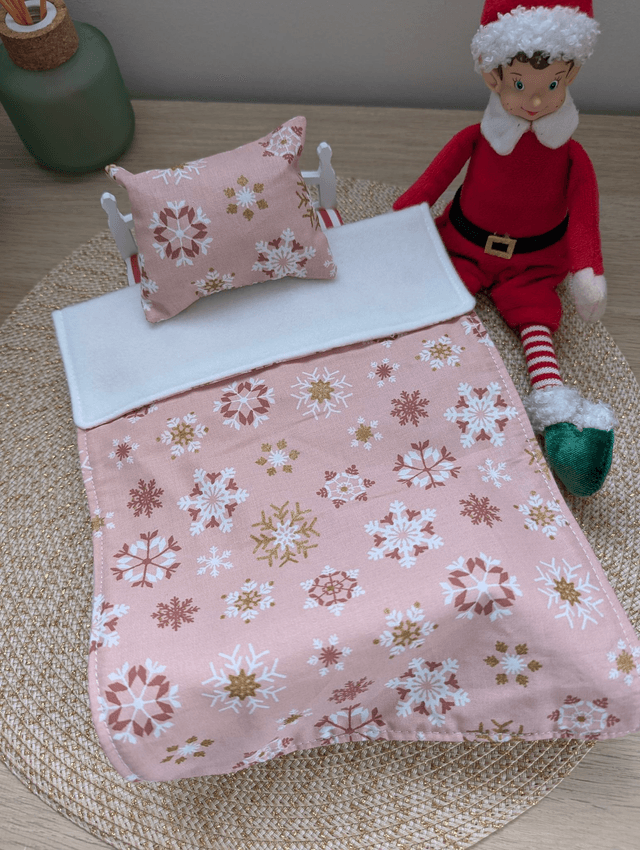 Parure de lit pour lutin farceur "rose flocons dorés"